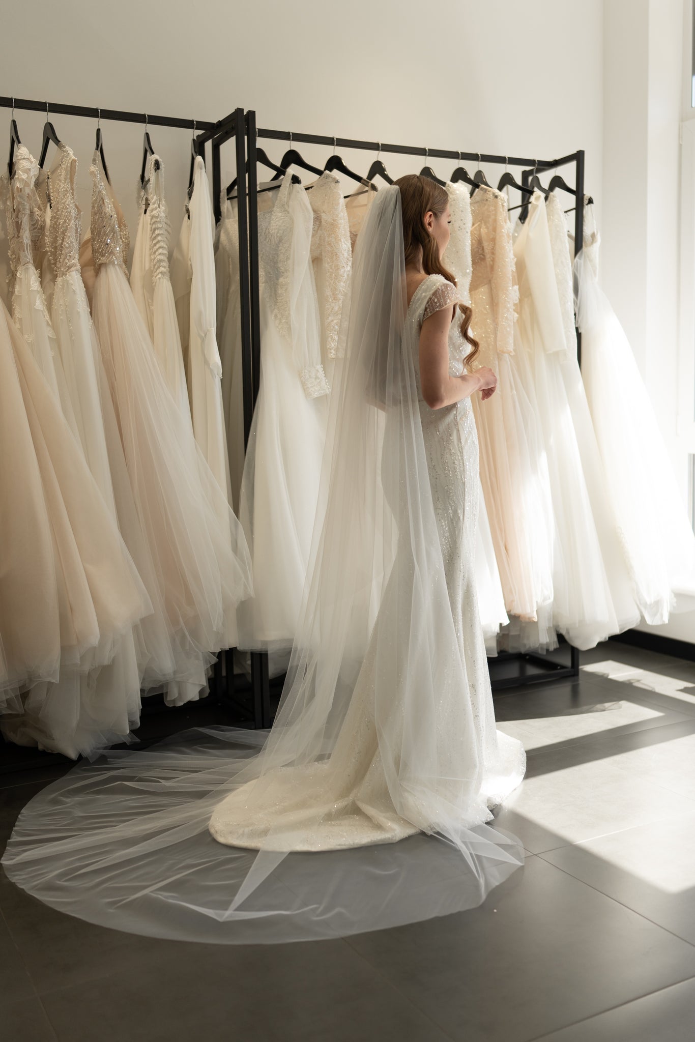 Back view of long bridal veil with angel cut drape