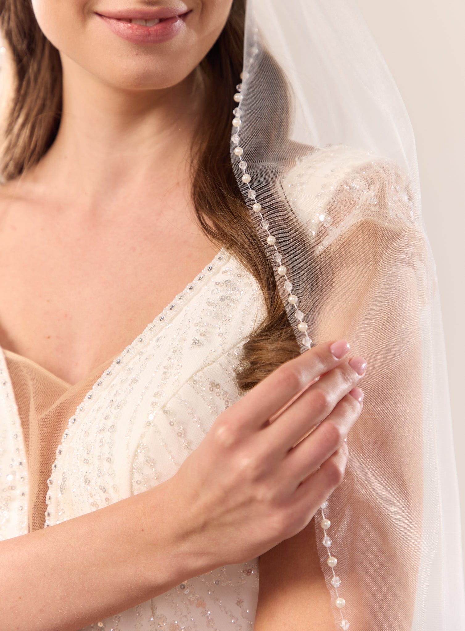 Beaded trim wedding veil