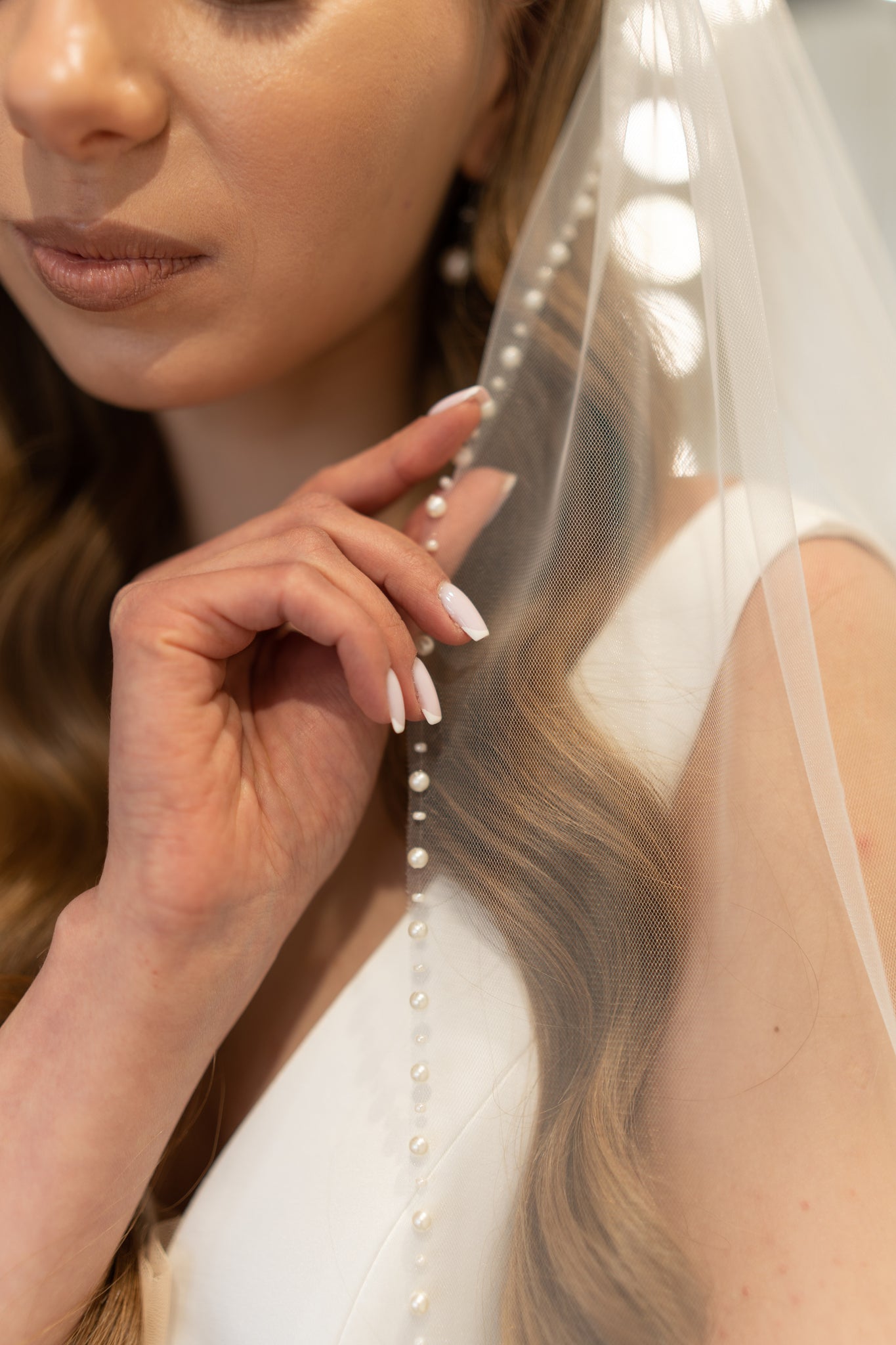 Pearl beaded edge wedding veil