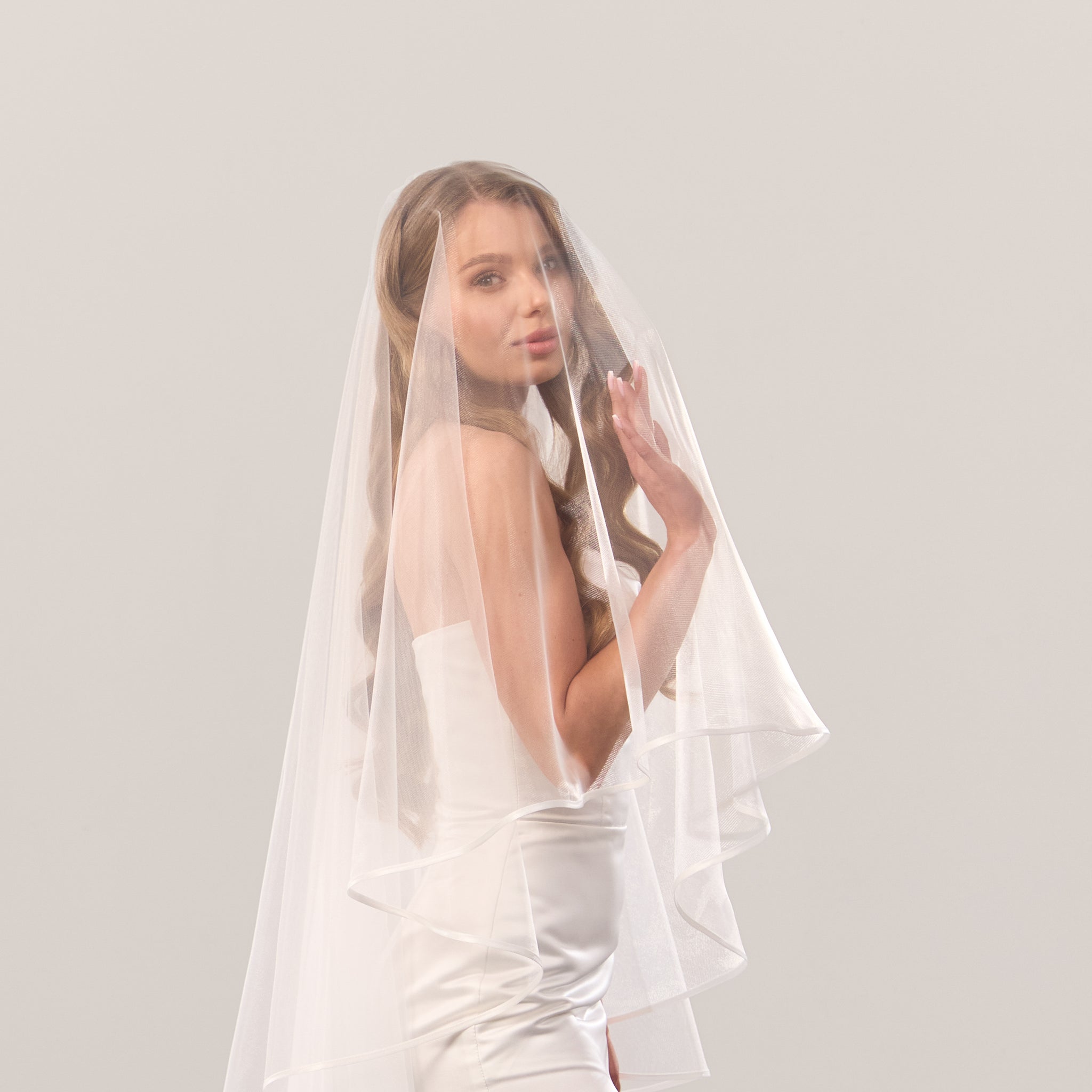 Satin trim wedding veil with blusher