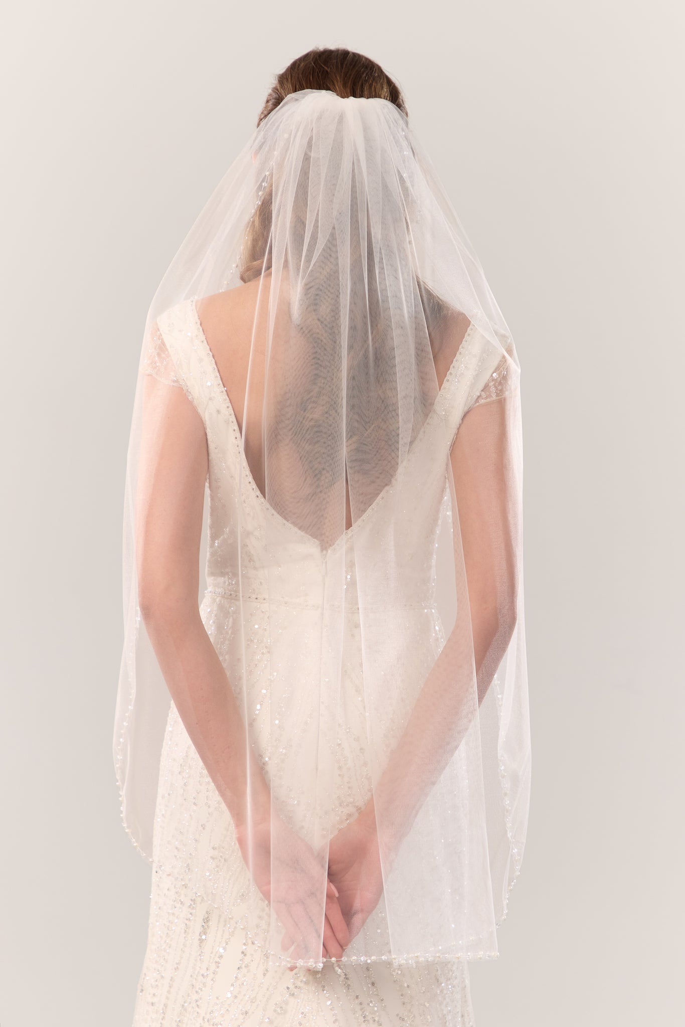 Beaded trim wedding veil