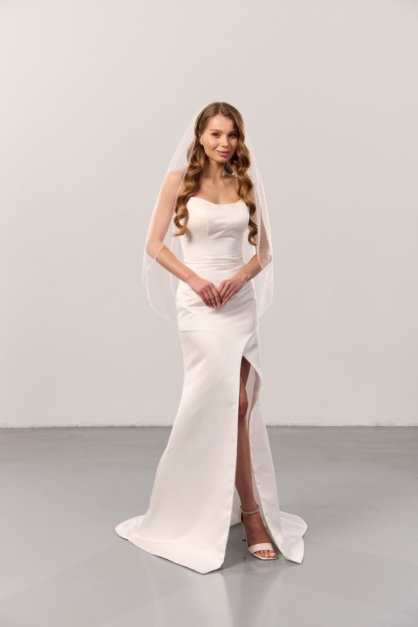 Pearl beaded trim wedding veil