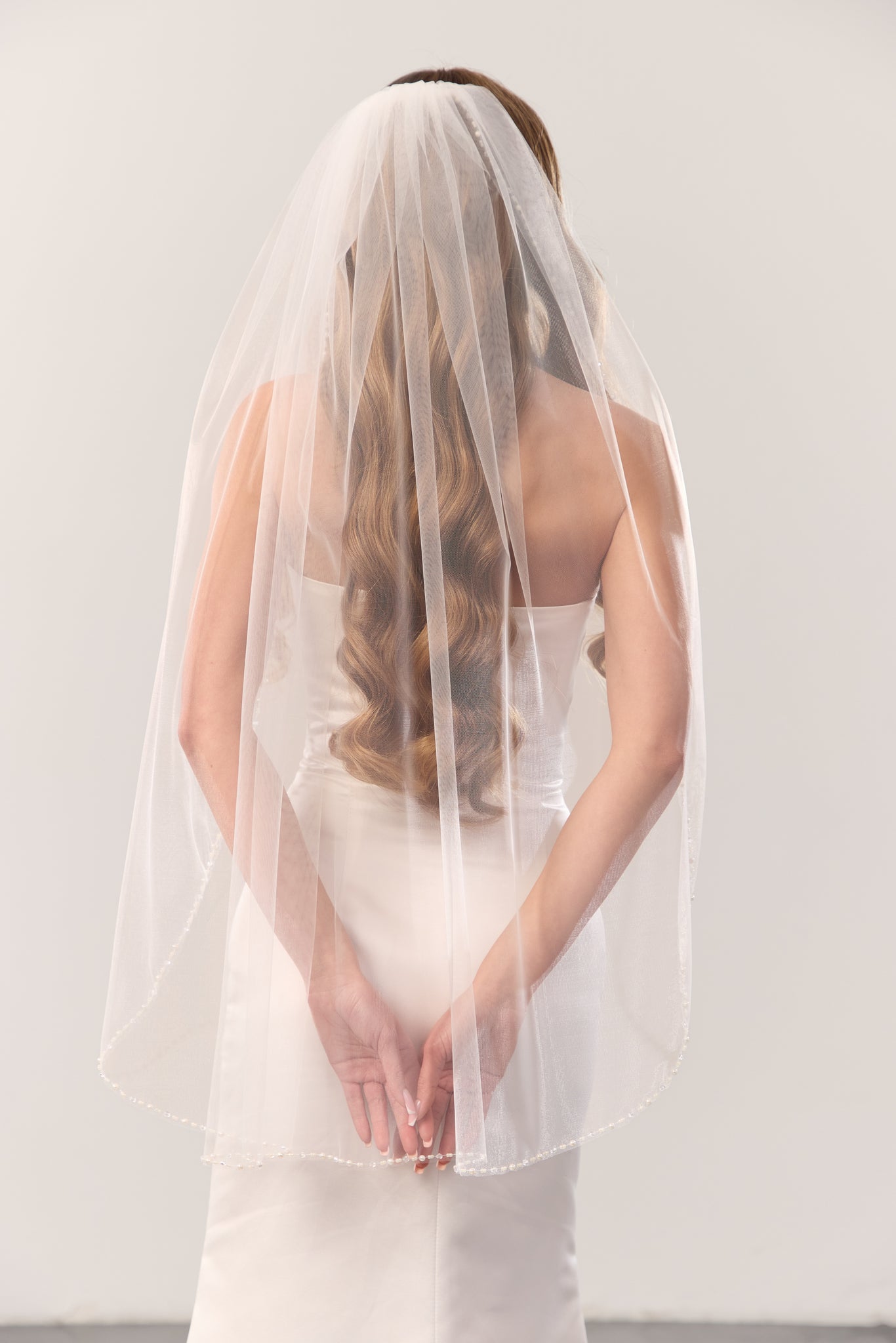 Pearl beaded trim wedding veil