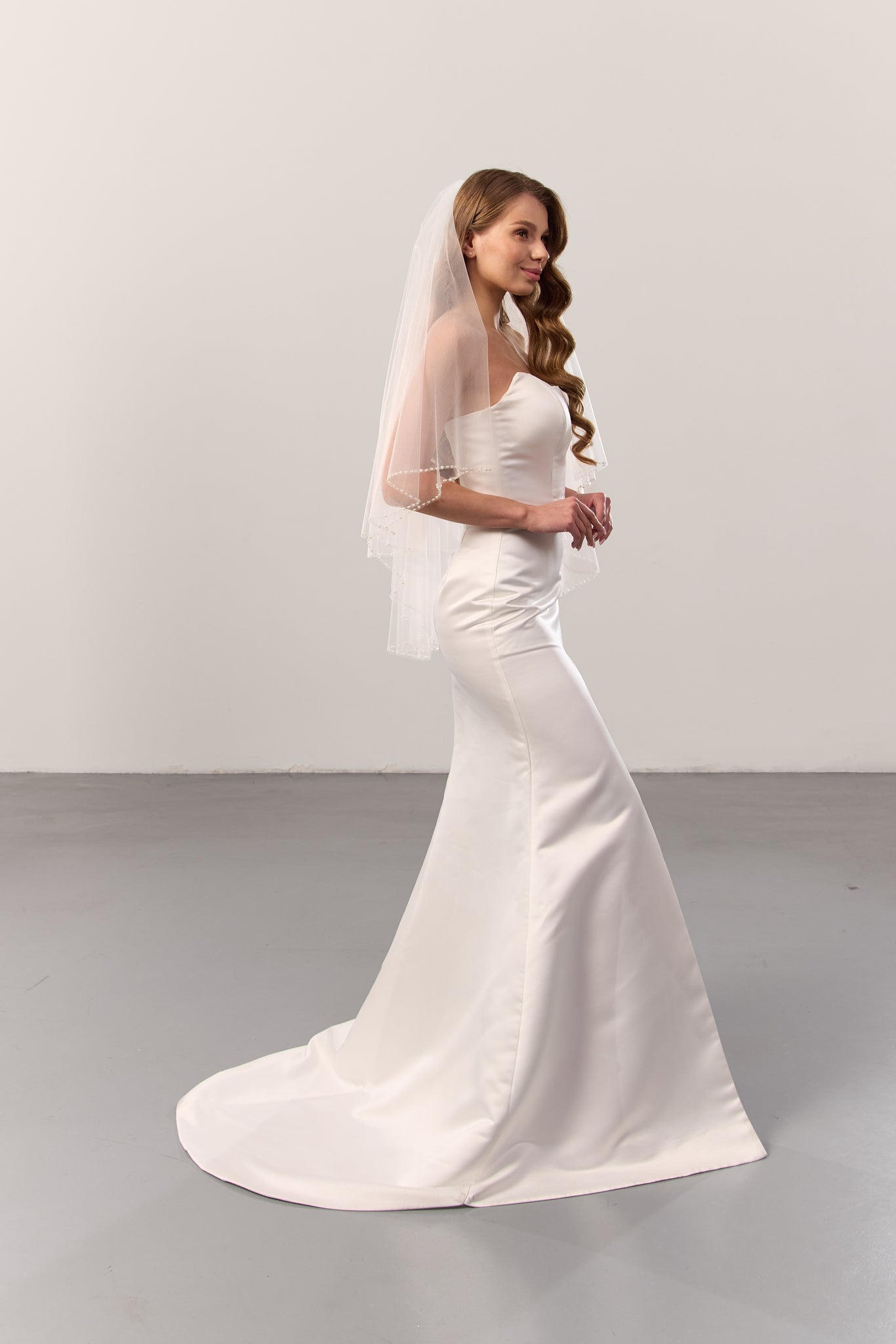 Pearl beaded wedding veil with blusher