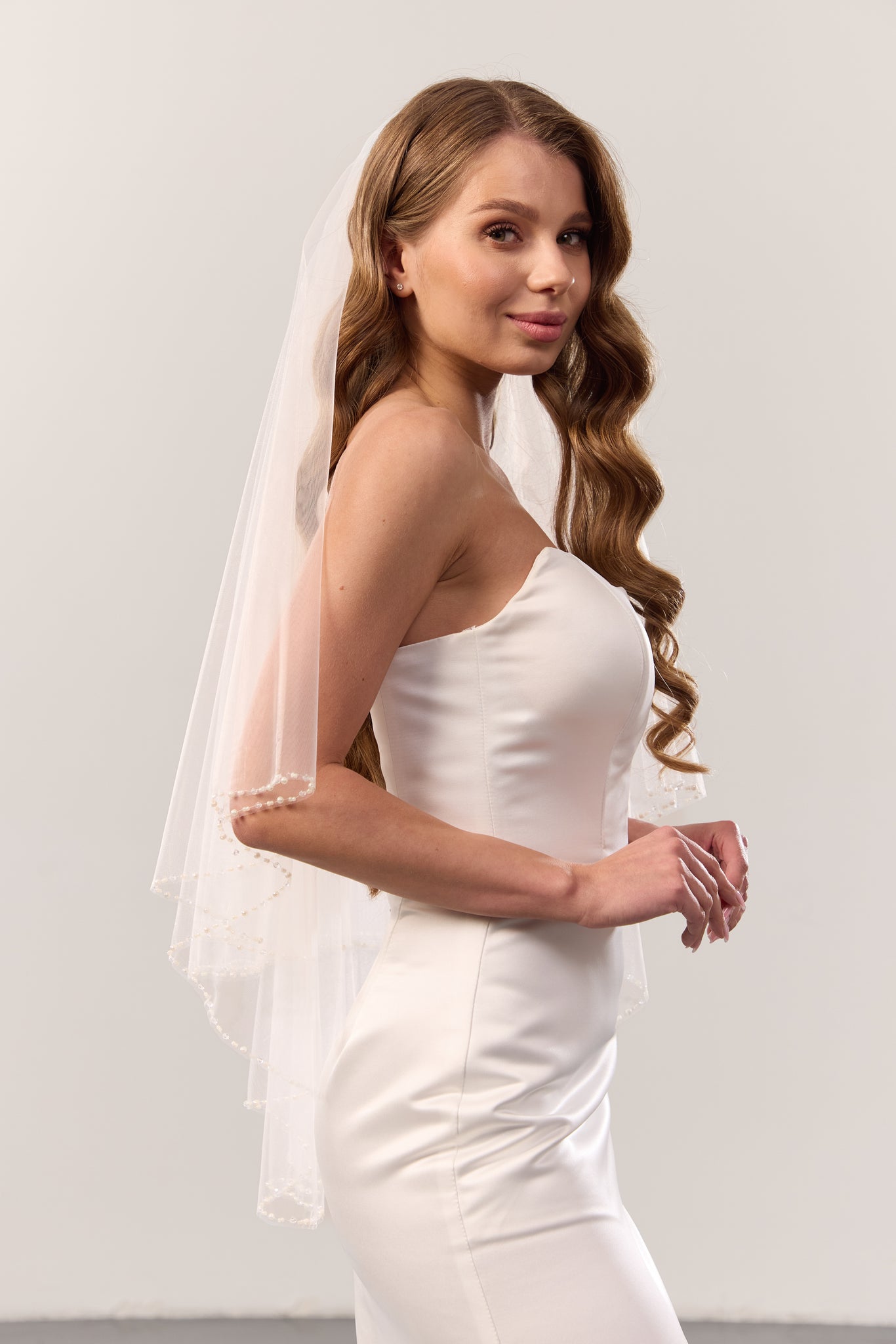 Pearl beaded wedding veil with blusher