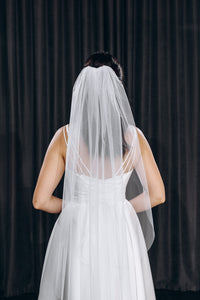 Cascading cut edge wedding veil