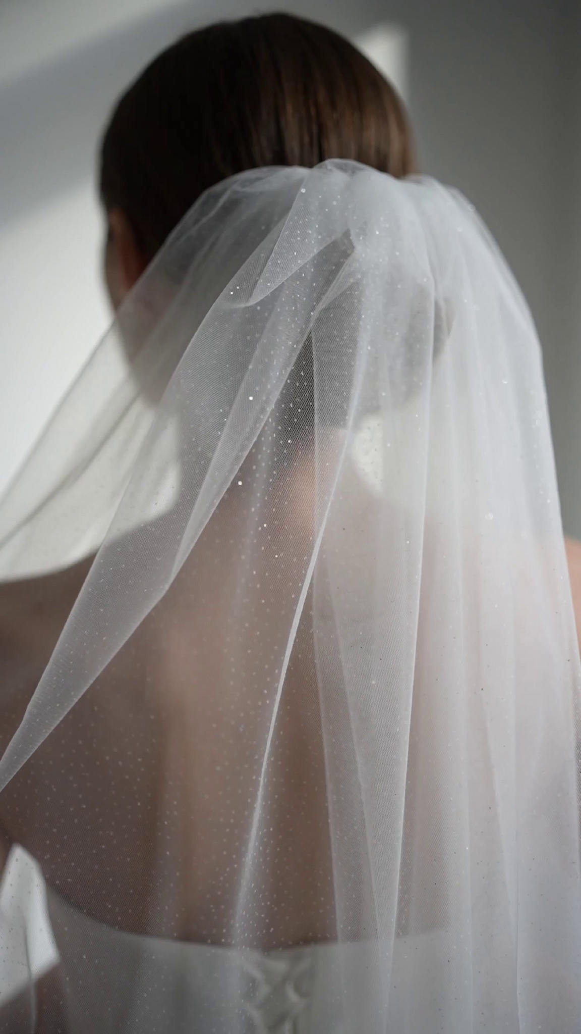 Short bridal veil with sparkle